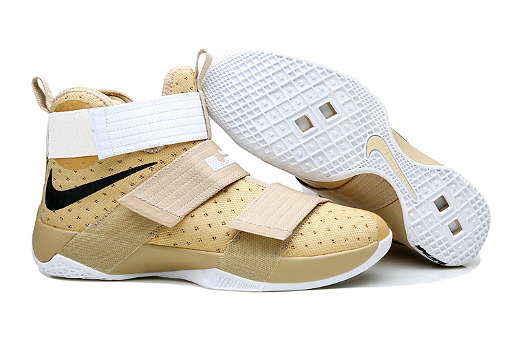 white and yellow nike basketball shoes