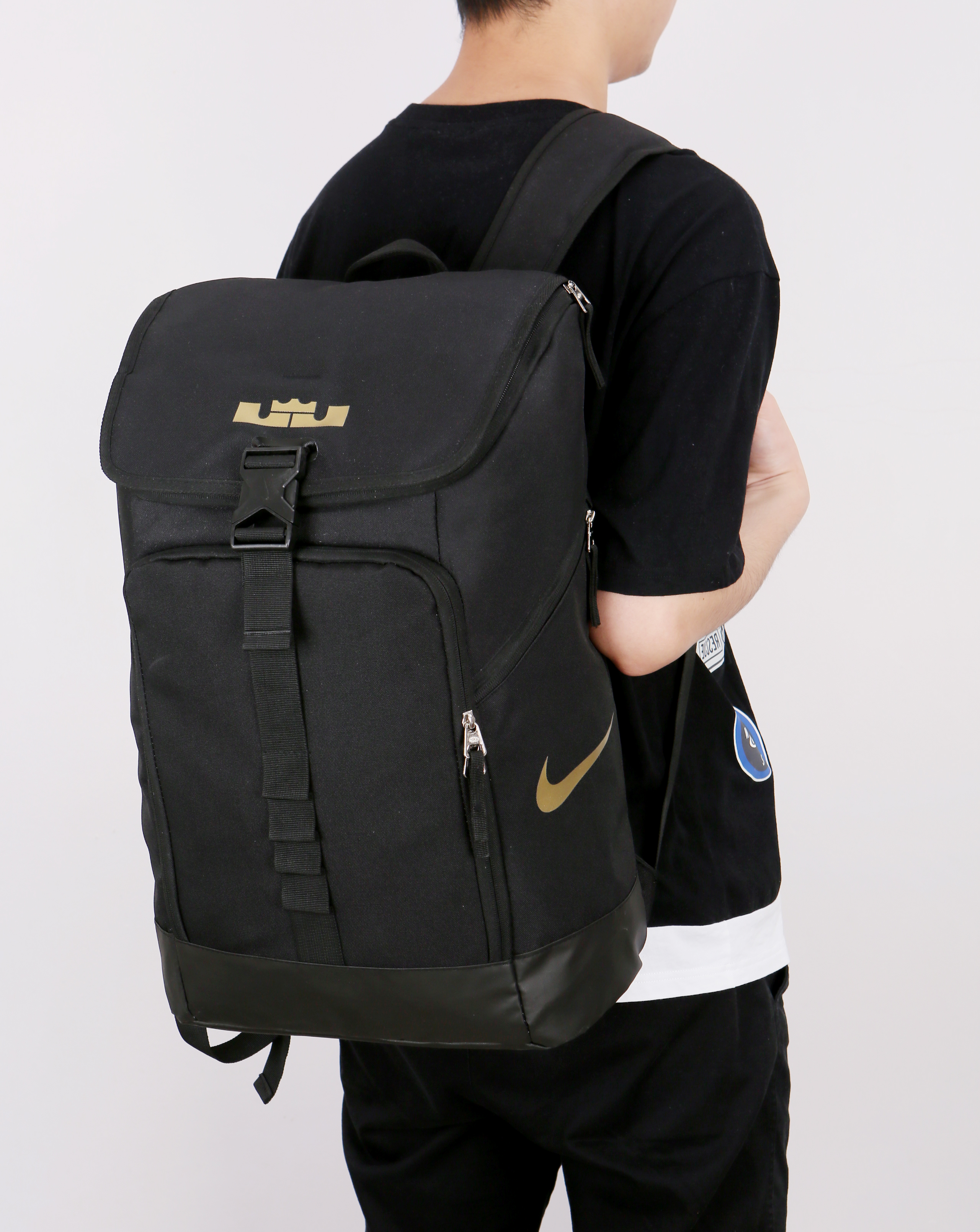 black and gold backpack nike