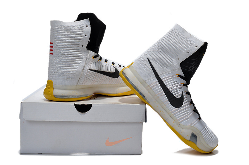 white and yellow basketball shoes
