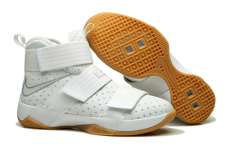 white and yellow nike basketball shoes